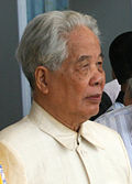 https://upload.wikimedia.org/wikipedia/commons/thumb/f/fb/Do_Muoi_cropped.jpg/120px-Do_Muoi_cropped.jpg